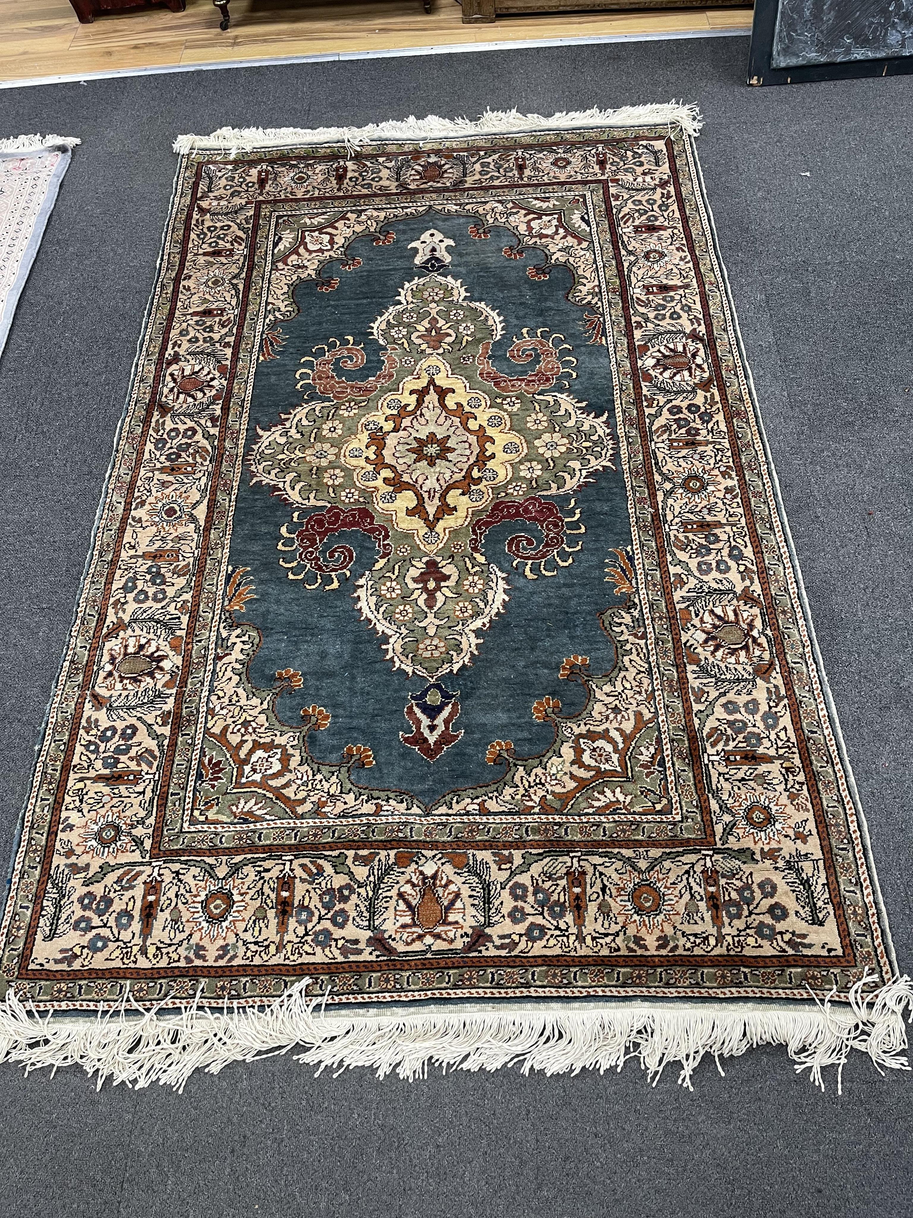 A North West Persian blue ground rug, 190 x 120cm